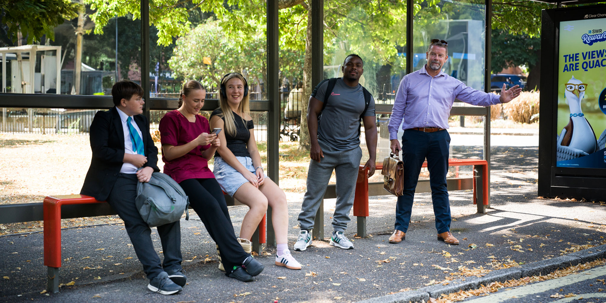 customers at a bus stop